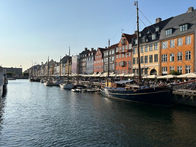 Canal with sail boats floating in the water