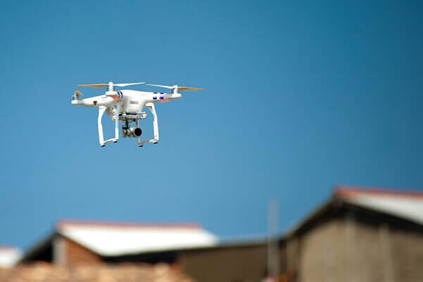 Drone with camera attached flying