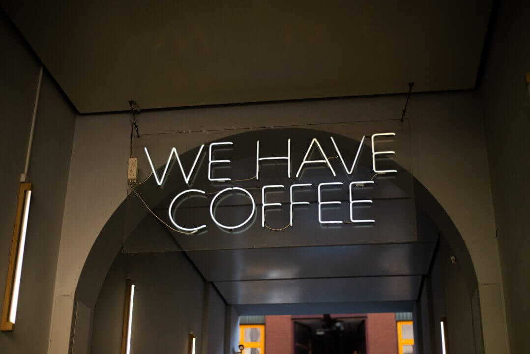 We have coffee sign on wall
